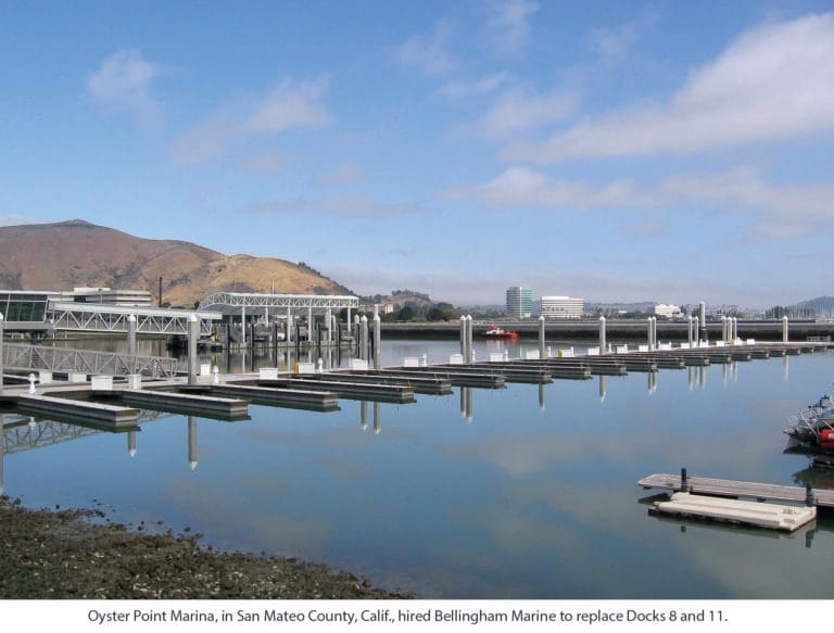 Oyster Point Marina dock upgrades - Newly upgraded floating docks at Oyster Point Marina with clear blue water and boats moor