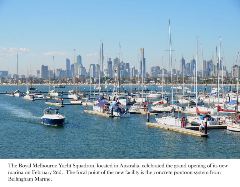 Concrete pontoons at St Kilda Harbour marina opening, showcasing modern dock facilities under clear skies.