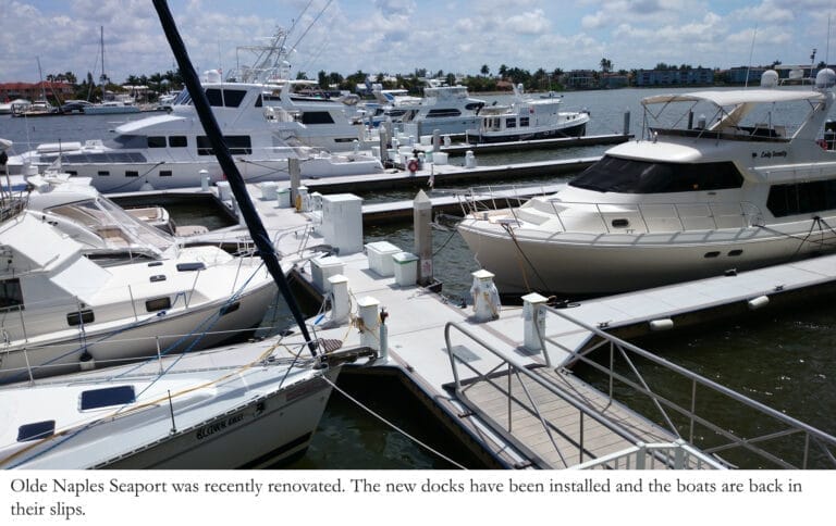 Olde Naples Seaport renovation - Concrete floating docks at Olde Naples Seaport with boats moored, highlighting the recent re