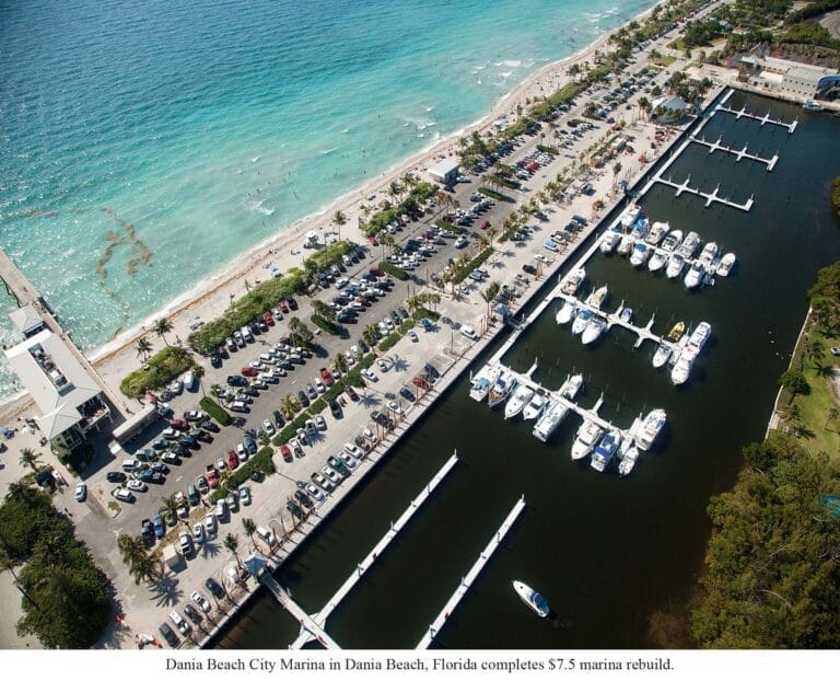 Concrete docks at Dania Beach Marina showcasing Dania Beach dock system innovation with boats moored along the waterfront.