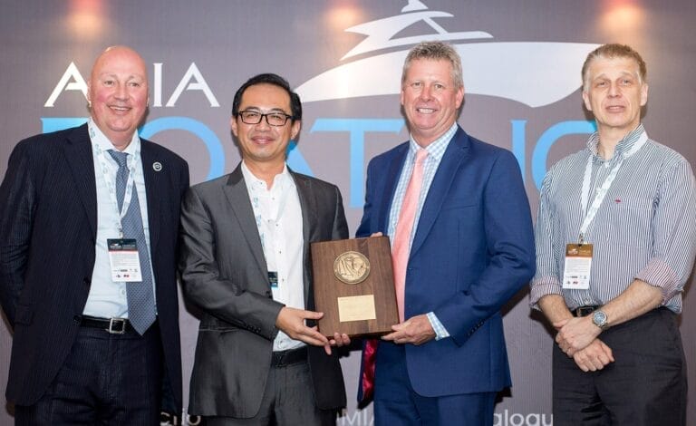 Robert Perocchio, Peter Jansen, Trevor Fong, and Gary Charlwood receiving the Marina Excellence Design Jack Nichol Award at t
