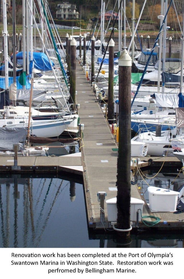 Boats docked at Swantown Marina with construction equipment visible, highlighting Swantown Marina renovation 2026.