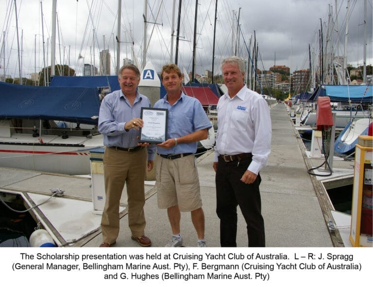 Group of people smiling and holding certificates, celebrating the intermediate marina management scholarship achievement.