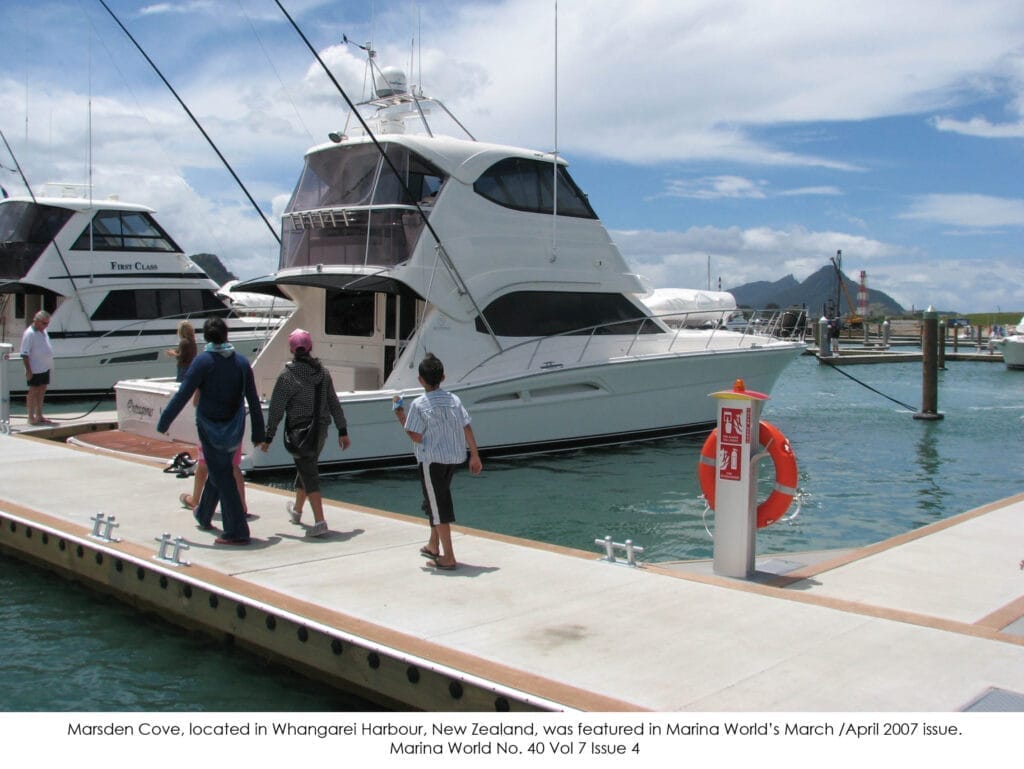 Aerial view of Marsden Cove Marina development featuring docks, boats, and surrounding waterfront properties.