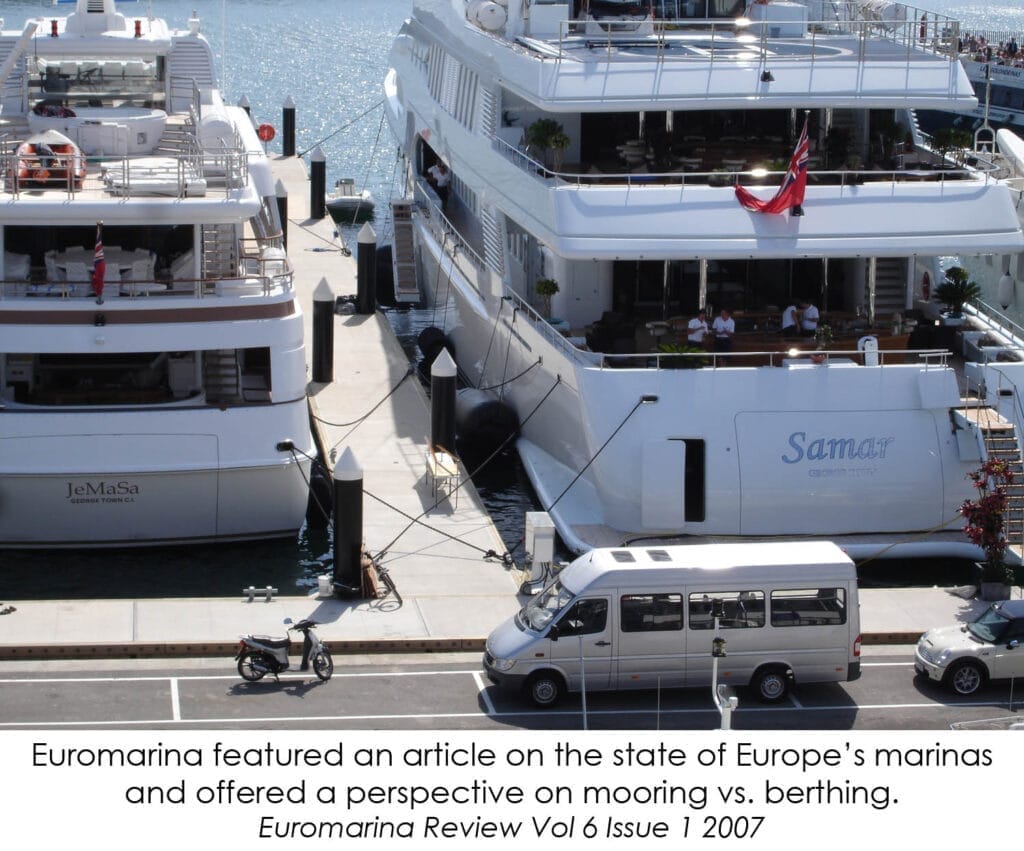 A marina with several boats docked, illustrating mooring and berthing expectations in a calm, organized setting.