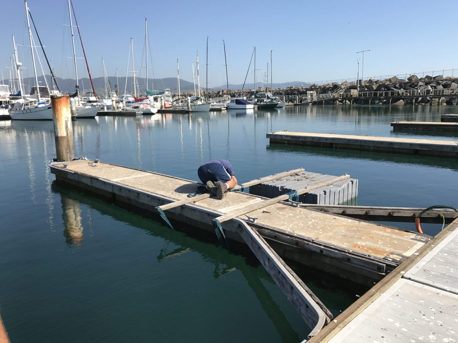 Coffs Harbour Marina storm repair with new pontoons installed by Bellingham Marine, showcasing extensive dock restoration wor