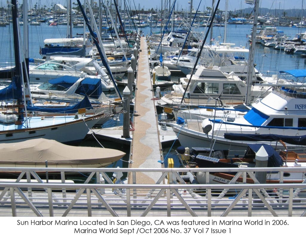 LEED certified marina San Diego with boats docked, surrounded by lush greenery and clear blue skies, emphasizing sustainabili