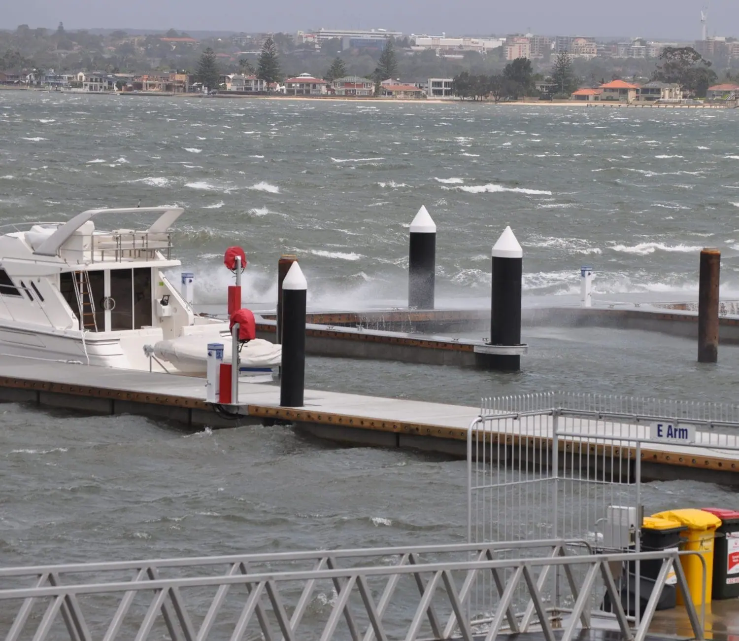 Floating breakwater with berths on backside