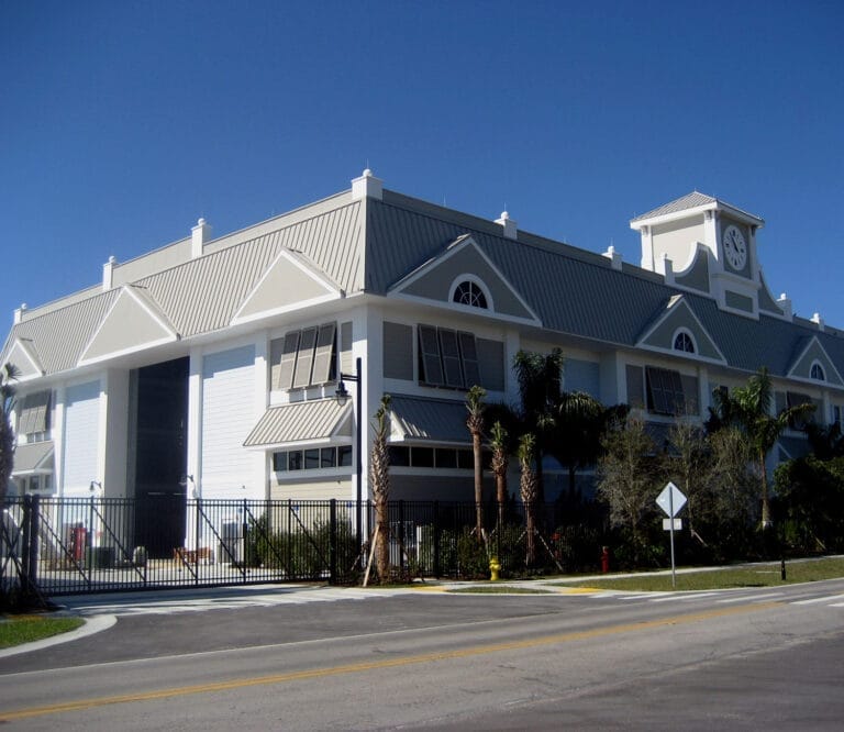 Modern facility for customizable boat drystack storage at Tarpon Point, featuring stacked boats in a large, organized structu