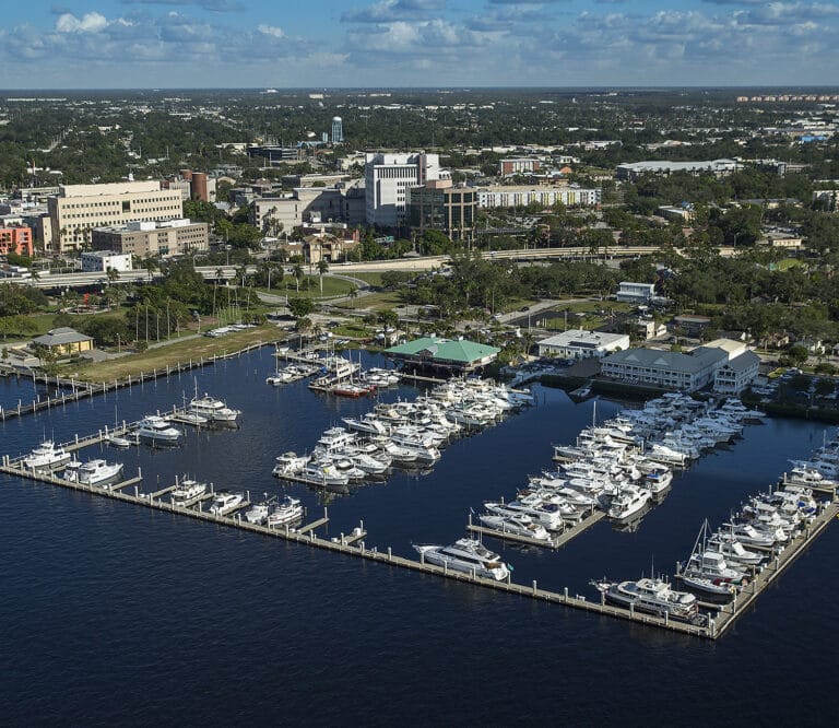 Concrete floating wave attenuators at Legendary Marina, showcasing their robust structure and effectiveness in calming waves.